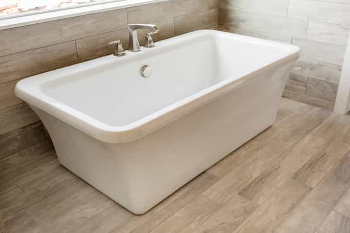 An all-white luxury bathtub installation for a Bell Gardens, California home
